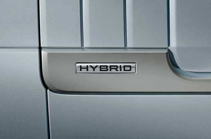 Range Rover Hybrid badge close-up.