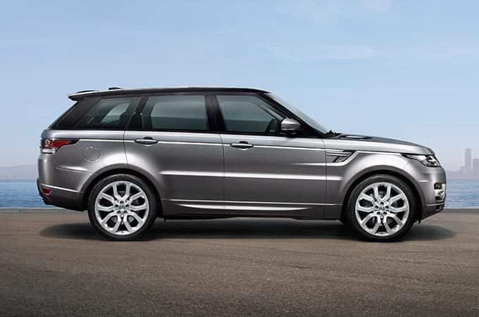 Second Generation Range Rover Sport on waterfront side view.