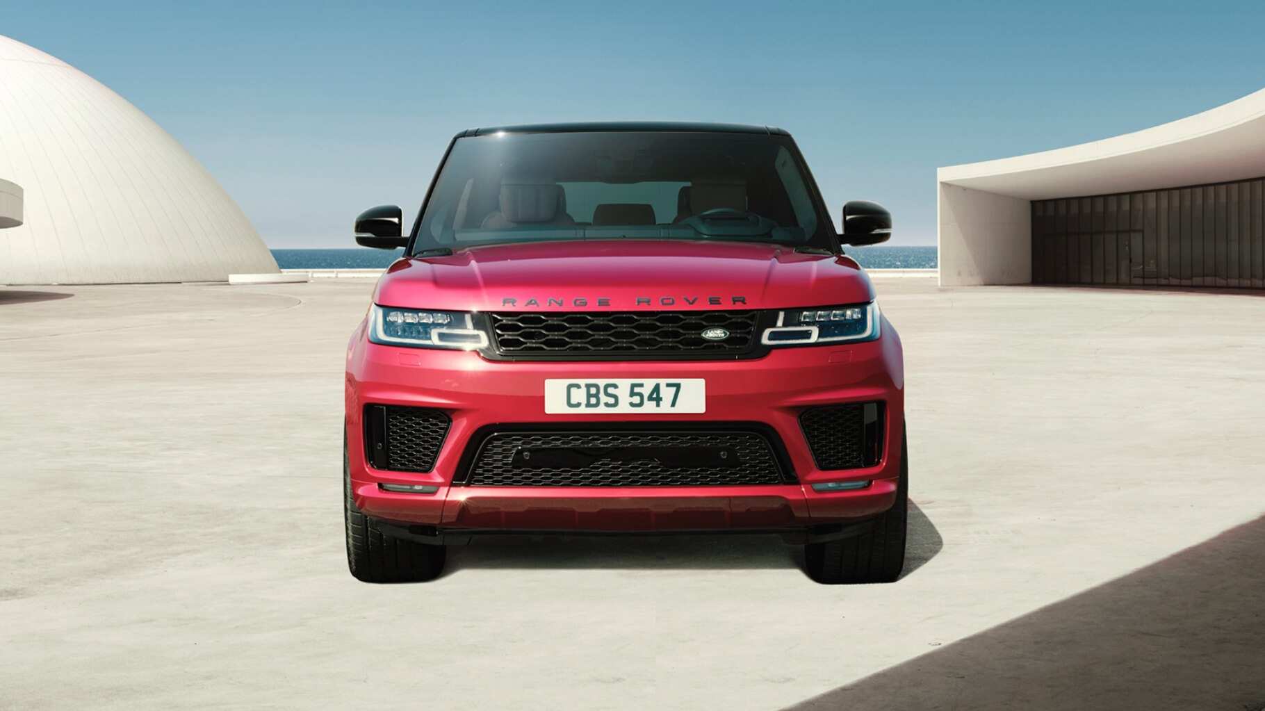 Front View of Red Range Rover Sport.