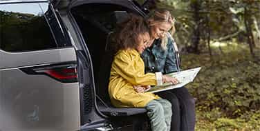 Woman and Child reading 